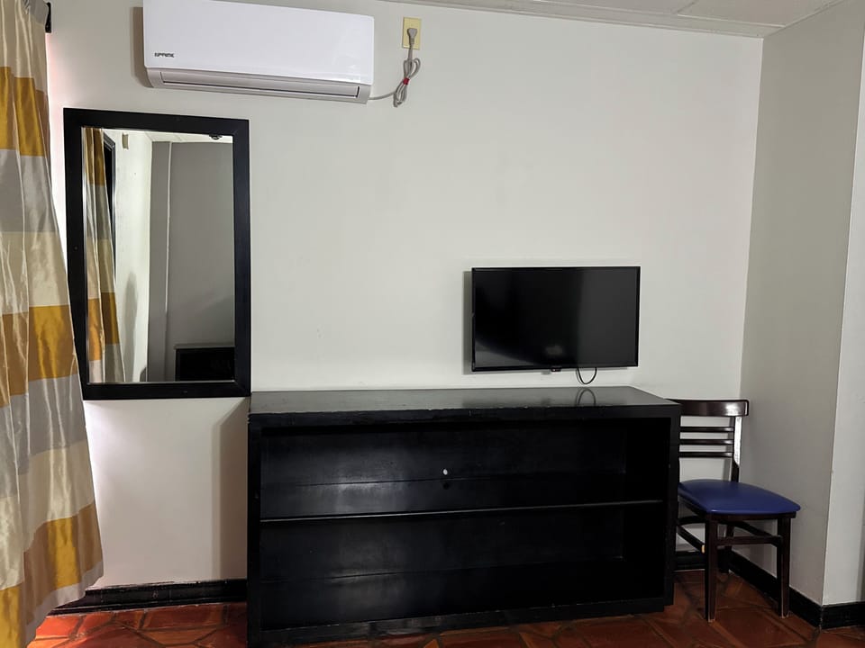 Single Room, Private Bathroom | Minibar (some free items), WiFi (free), bed sheets