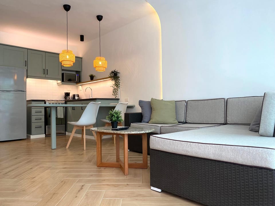 Superior Apartment, 1 Bedroom, Pool View | Living area | Flat-screen TV