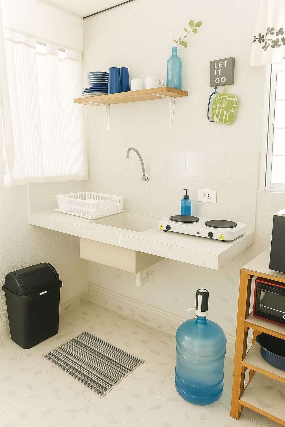 Bathroom sink with mirror and under-sink storage.