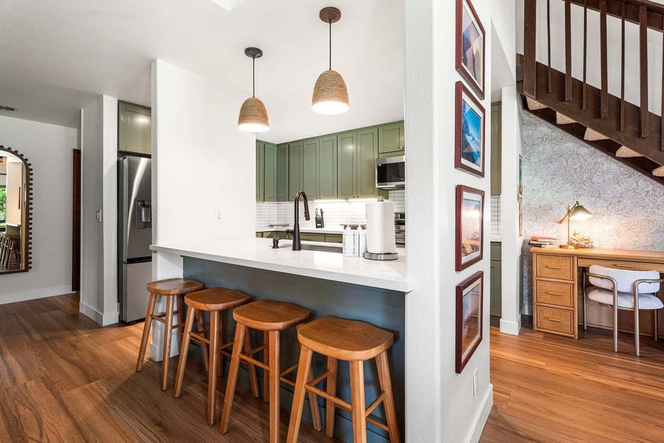 Easy connection between the kitchen, dining, and living areas
