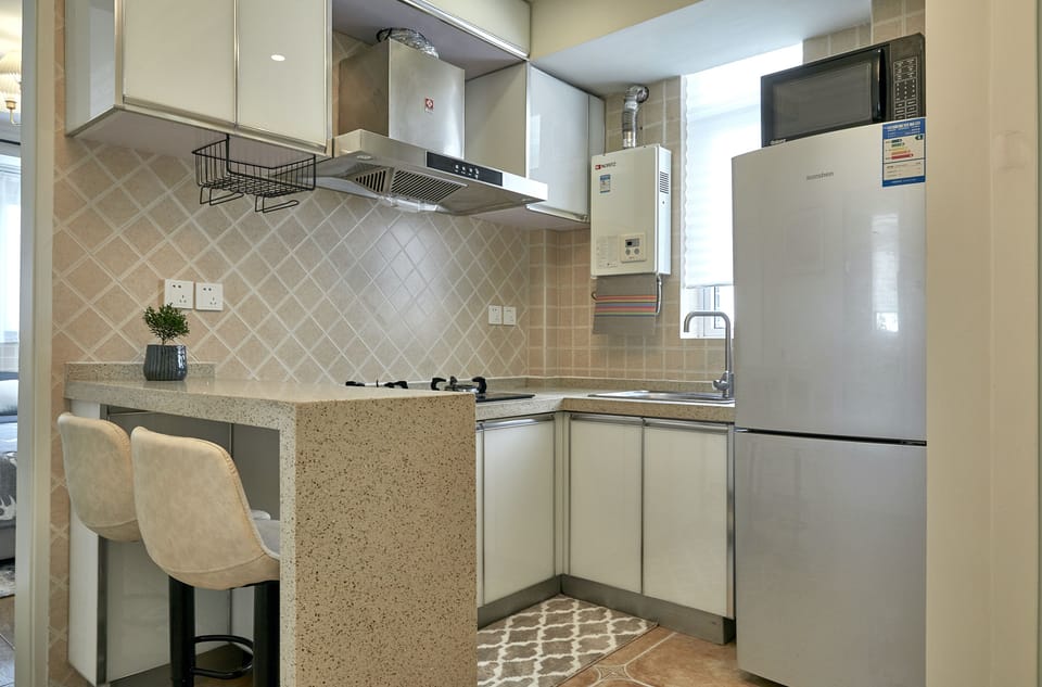 Superior Studio, Courtyard View | Private kitchen | Fridge, microwave, stovetop, cleaning supplies