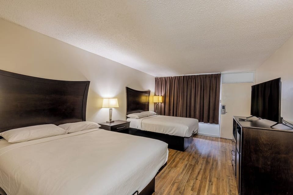 Room, 2 Queen Beds, Non Smoking | Desk, iron/ironing board, free WiFi, bed sheets