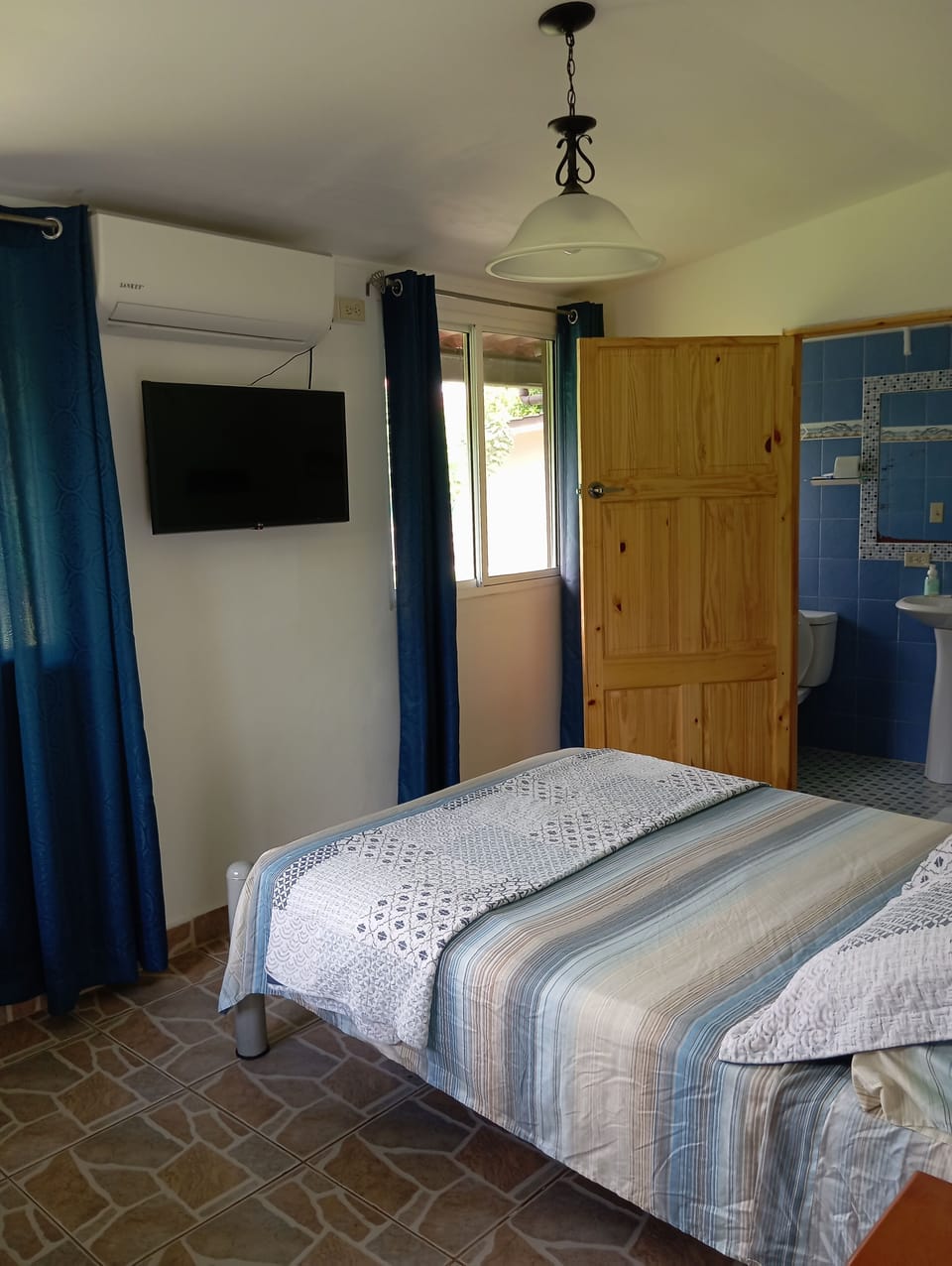 Double Room, Garden View | Minibar, desk, blackout drapes, free WiFi