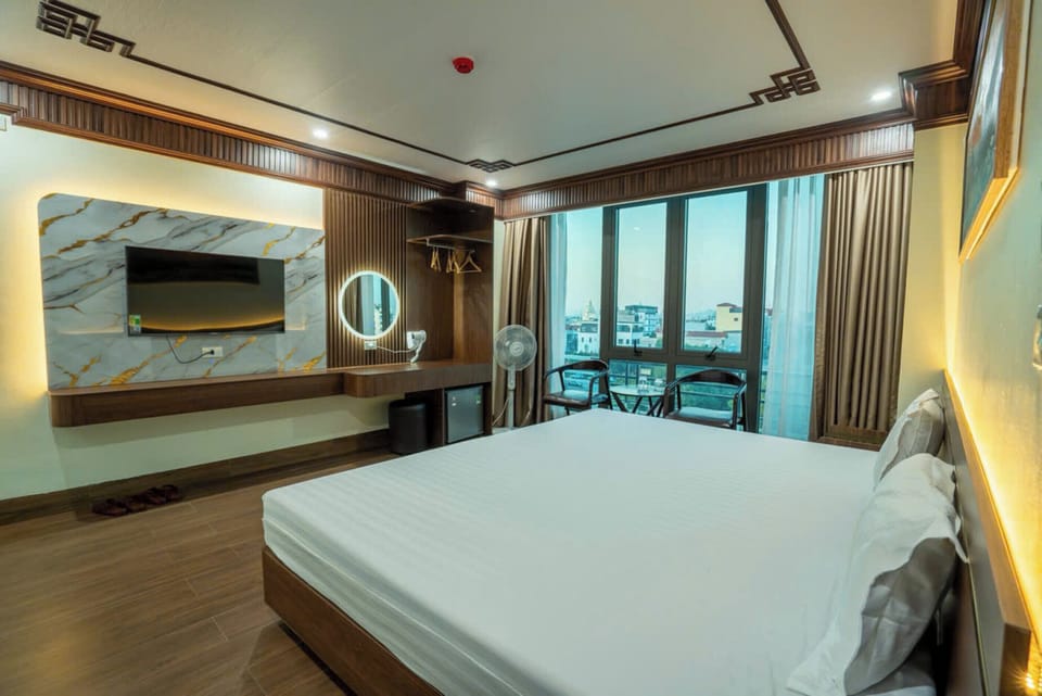 Deluxe Room, City View | Individually decorated, individually furnished, desk, laptop workspace