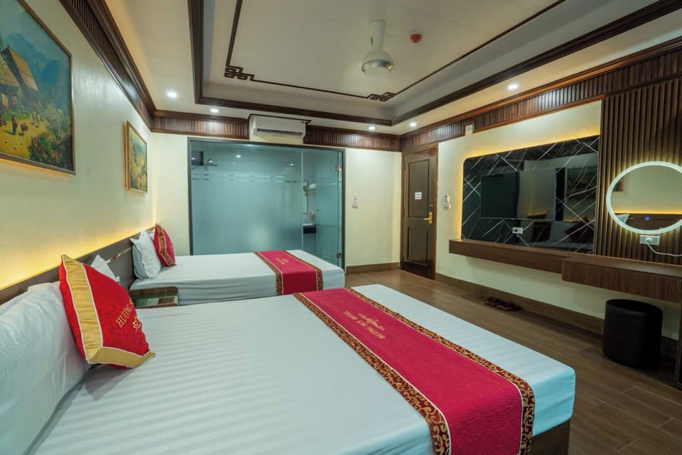 Deluxe Quadruple Room | Individually decorated, individually furnished, desk, laptop workspace