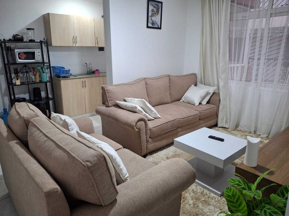 Deluxe Apartment, Balcony, City View | Living area | Smart TV