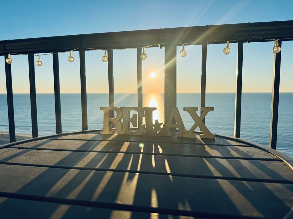 Watch the Sunrise off the oceanfront balcony