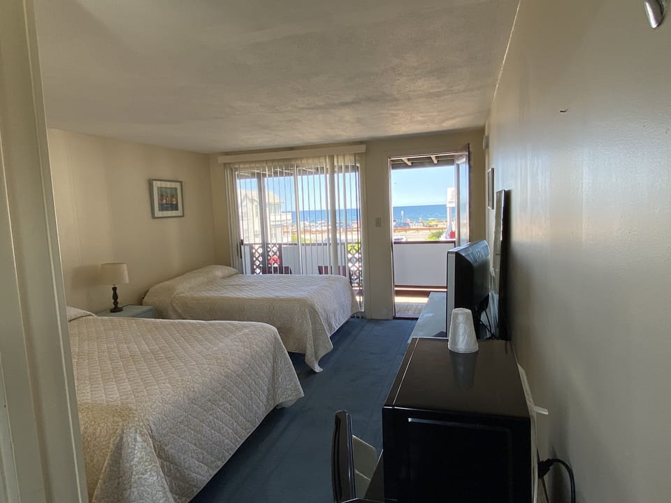 Room, 1 Queen and 1 Double Bed | WiFi (free), individually decorated, individually furnished, bed sheets