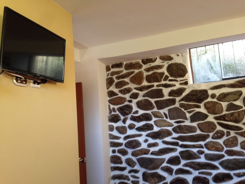 Family Room | In-room safe, desk, iron/ironing board (on request), WiFi (free)