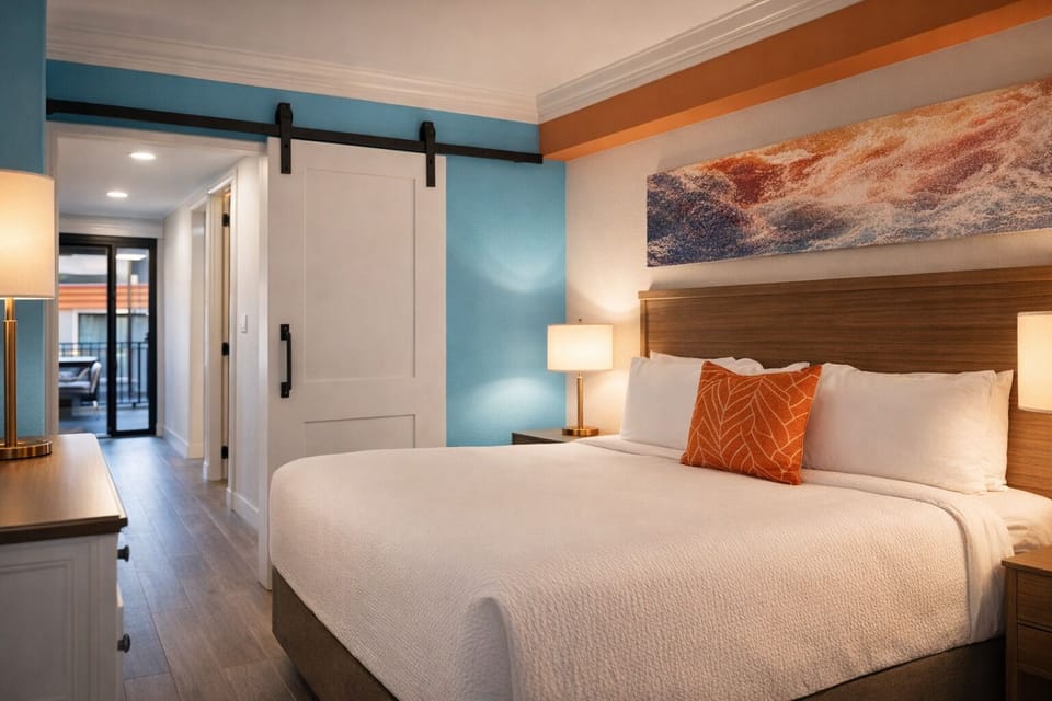 Drift off in a serene bedroom with warm, coastal style.
