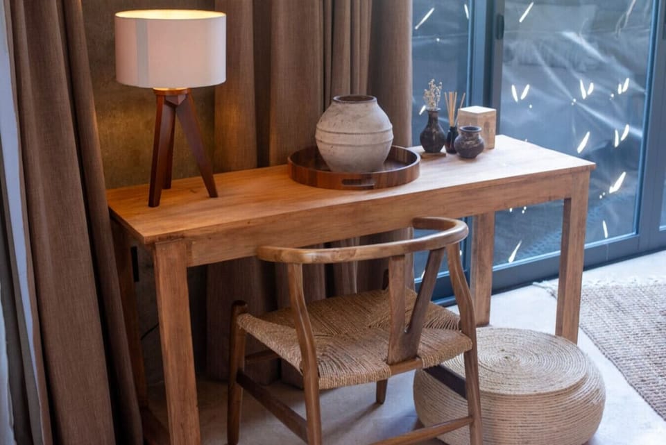 Whether you`re working remotely or journaling your travel memories, this cozy workspace offers comfort, functionality, and inspiring surroundings.