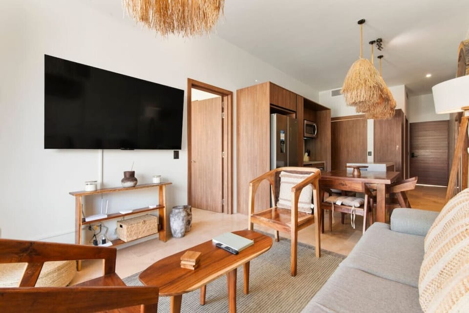 Relax, chill, and catch your favorite shows in style — comfy sofa, and HD TV await!