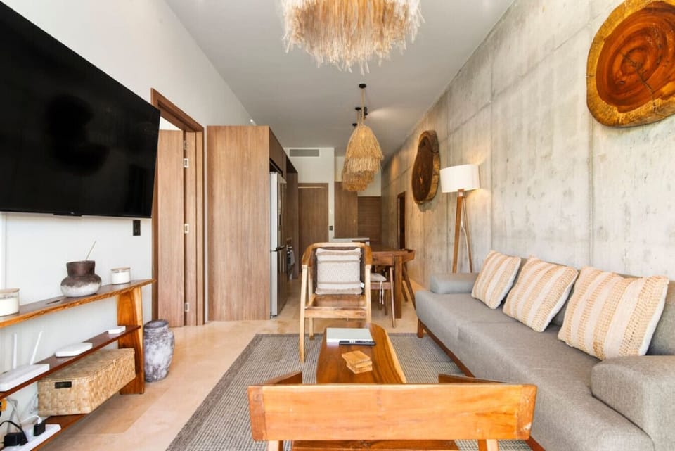 Step into comfort: unwind in the clean, cozy living space, kick back on the sofa, and enjoy HD TV.