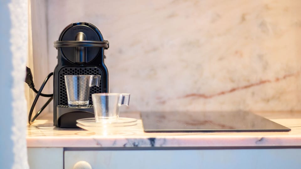 Coffee corner with quality espresso machine — your morning ritual made easy. #CoffeeLovers #MorningVibes #ComfortStay