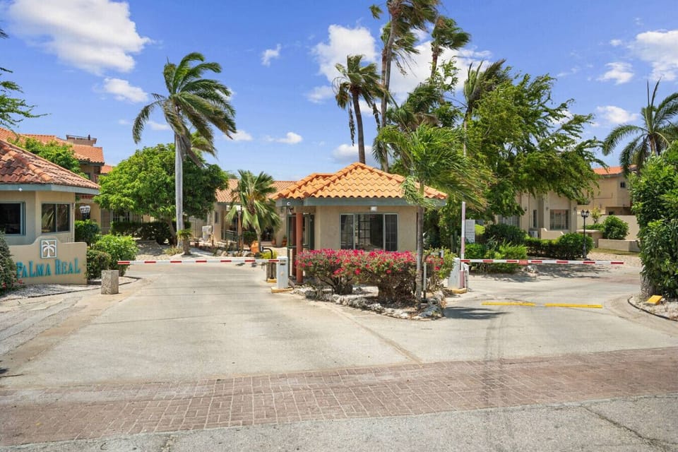 Front gate with security to make you feel secured at Palma Real. 24/7 security in the gated community of Palma Real