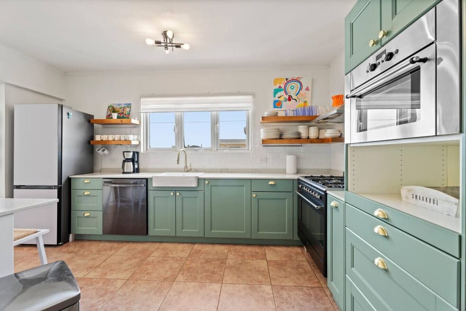 Spacious modern kitchen fully equipped for family and group vacations. Ideal for cooking, hosting, and effortless entertaining.