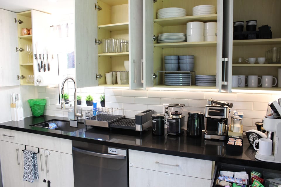 Plenty of dishes, plates, cups, etc. for everyone to enjoy meals together!