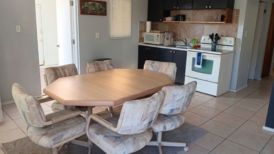 Dining area with kitchen access and seating
