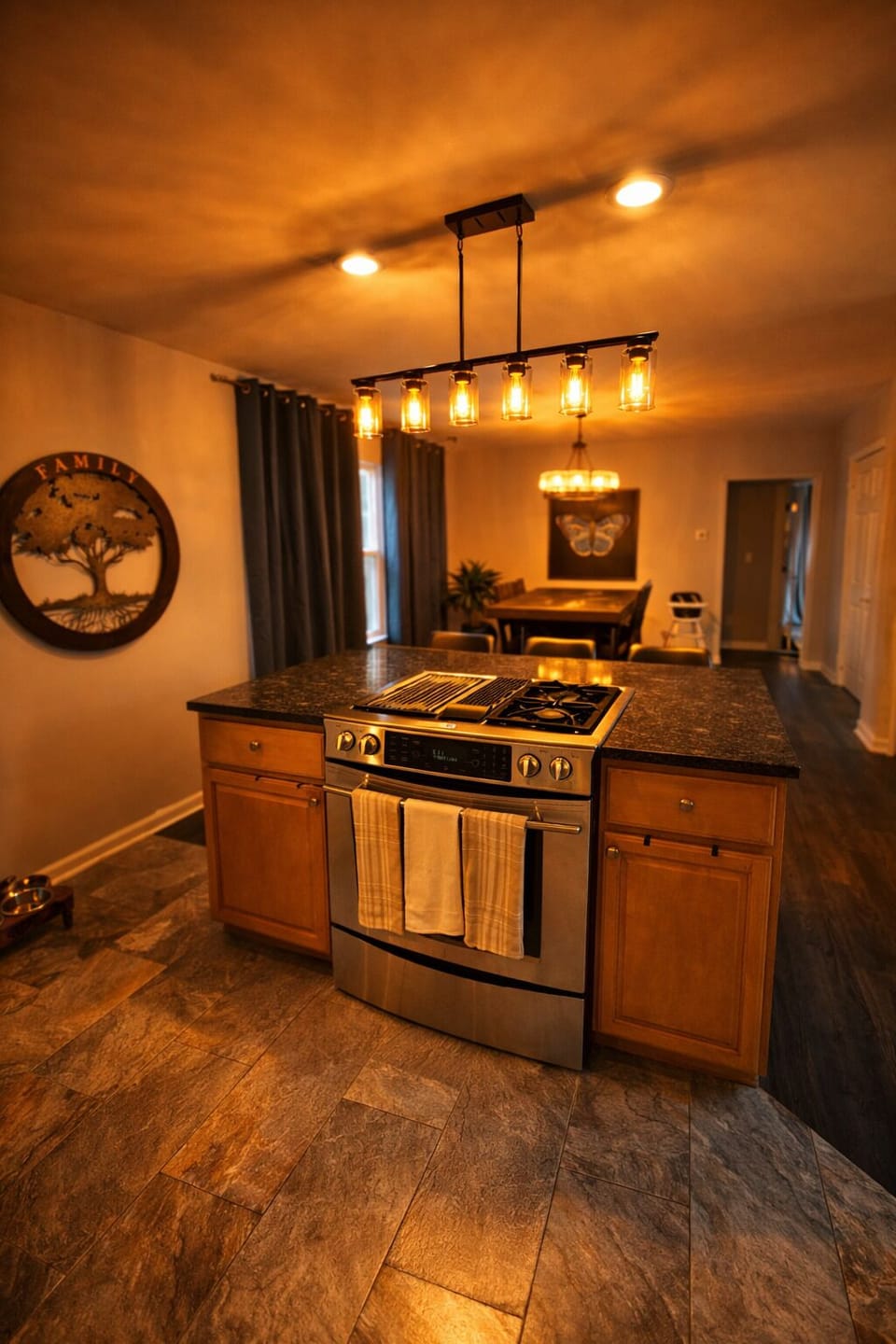 Fully equipped kitchen with warm cabin lighting and everything you need