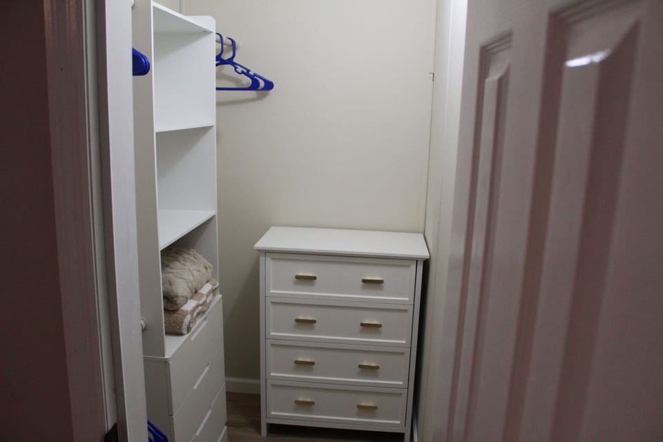 Walk in closet with 3rd bedroom