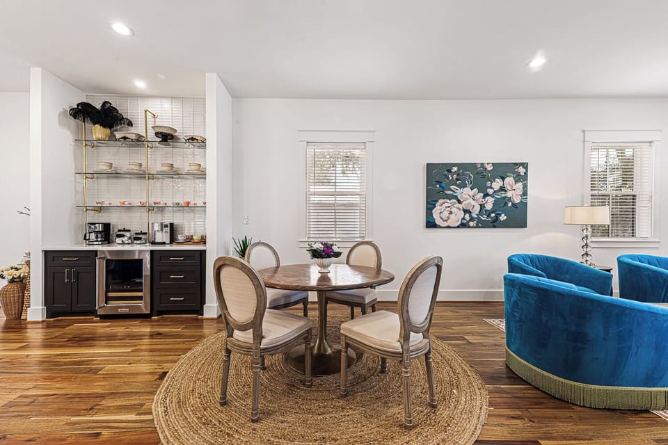 Enjoy a meal at the charming dining room table. Extra seating at kitchen island. 