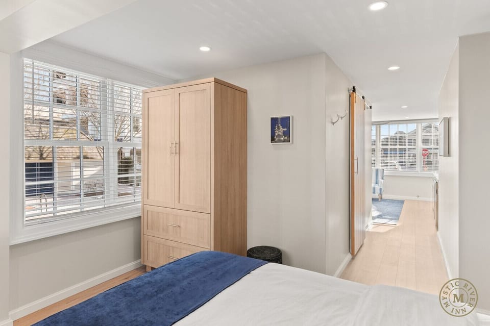 Perfect for long-term stays! Our bedroom offers ample storage space, including a double-door closet and a chest of drawers to keep your belongings organized