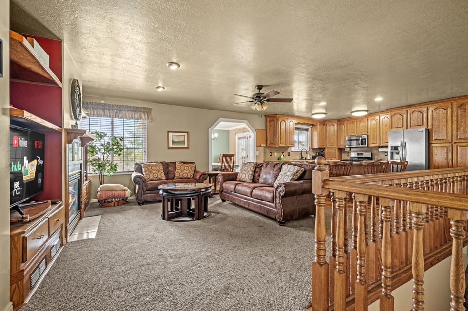 Open-concept main floor blends living room and kitchen.