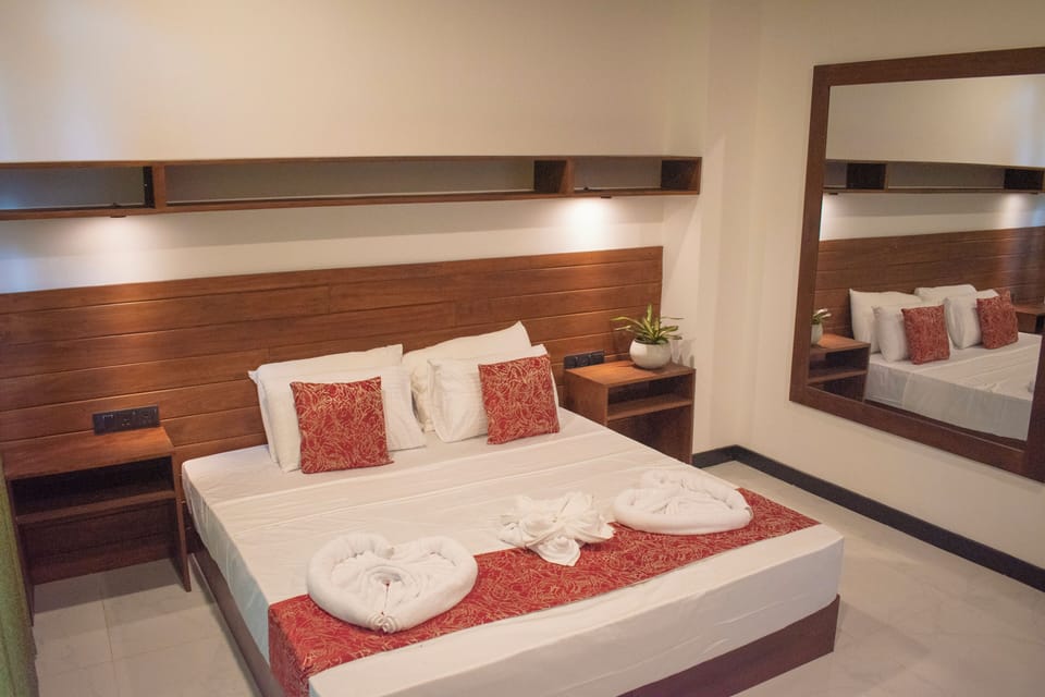 Deluxe Triple Room | Premium bedding, in-room safe, desk, laptop workspace