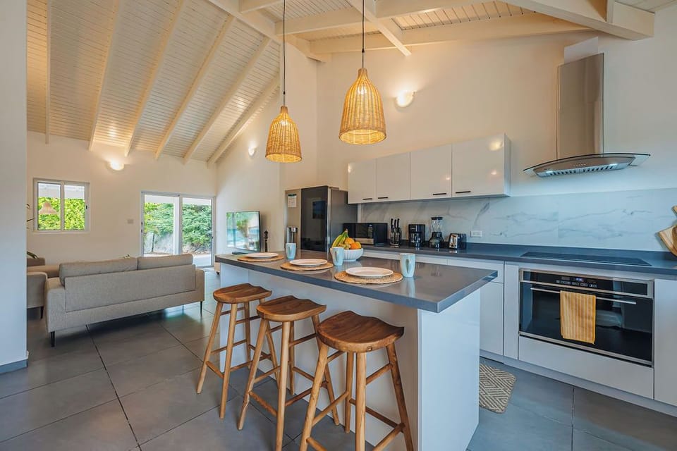 Indoor dining with views to the pool and patio.