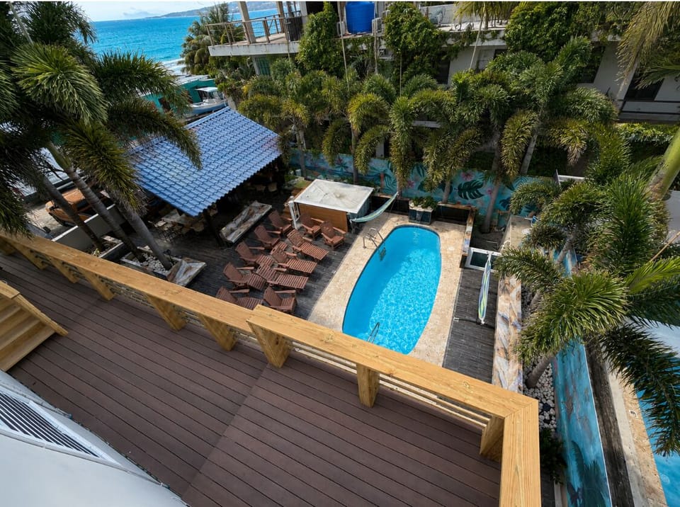 Enjoy the spacious pool area with a grill and plenty of seating to lounge in the sun!