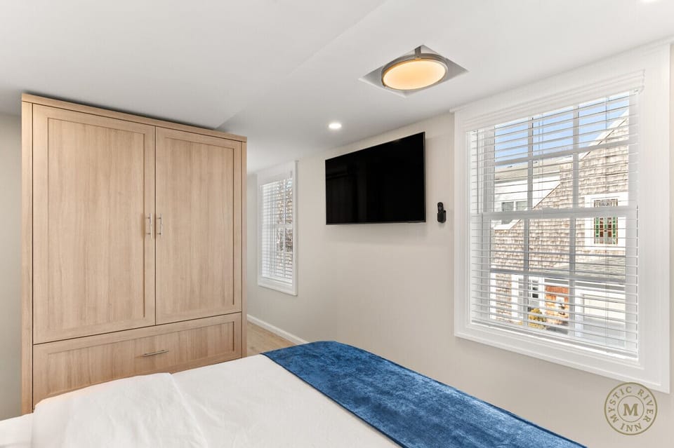 Your private sanctuary: Step into the spacious primary bedroom, tucked away for a quiet night`s rest.