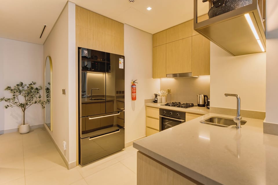 Luxury Apartment, Multiple Beds, City View | Private kitchen | Full-size fridge, microwave, oven, stovetop