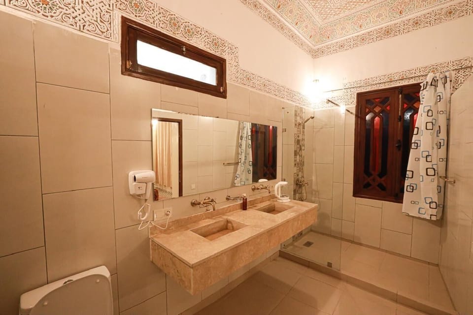 Shower, hair dryer, bathrobes, soap