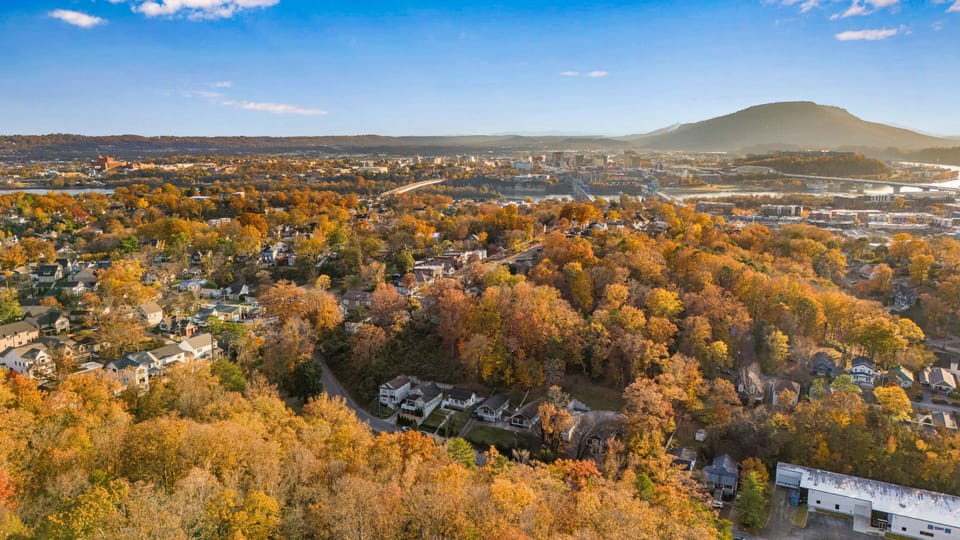Aerial view of Sylvan House, the Pedestrian Bridge, and downtown Chattanooga.