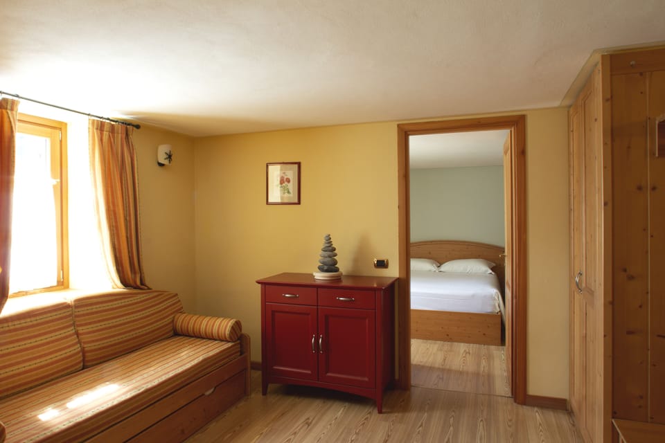 Traditional Apartment, Multiple Beds, Accessible, Kitchenette | Living area | 32-inch Smart TV with satellite channels, TV, toys