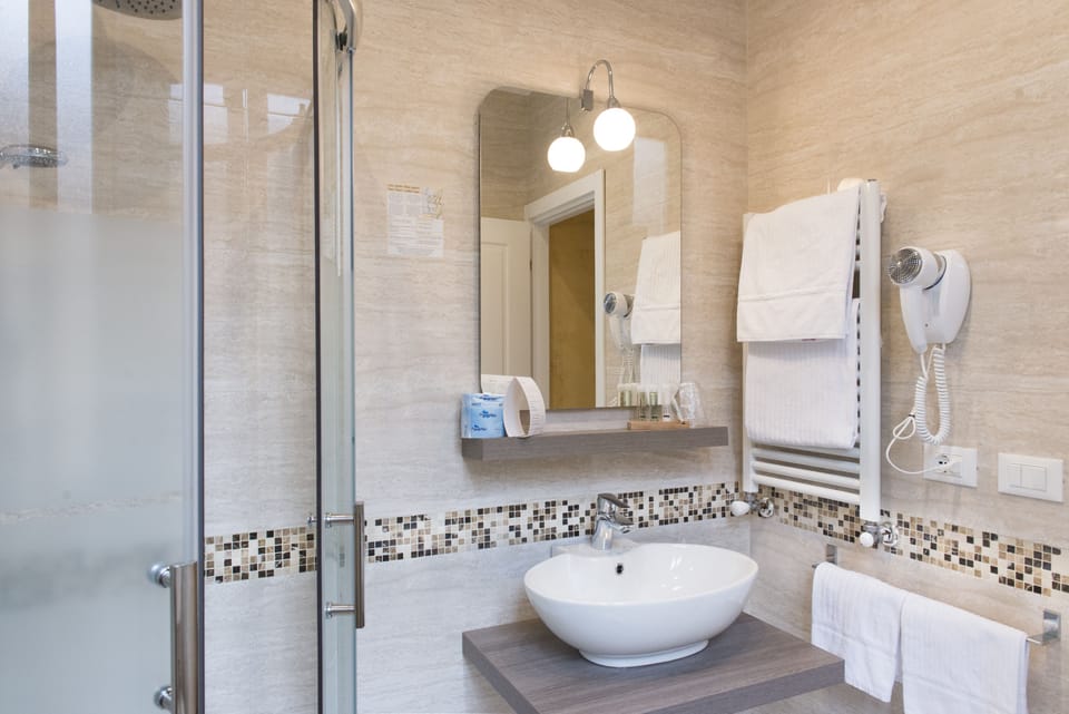 Shower, free toiletries, slippers, bidet