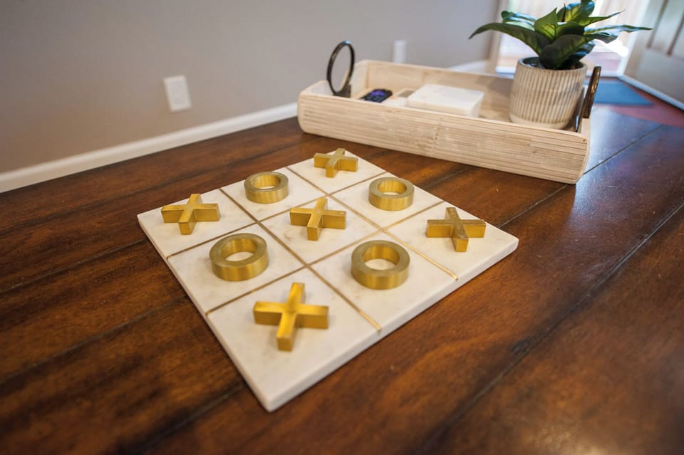 Tic Tac Toe plus other games and puzzles!