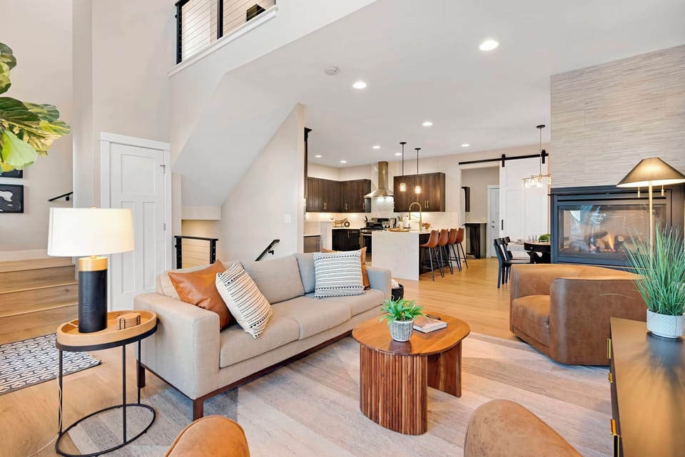 Featuring luxury furniture, a large screen TV and a warm fireplace