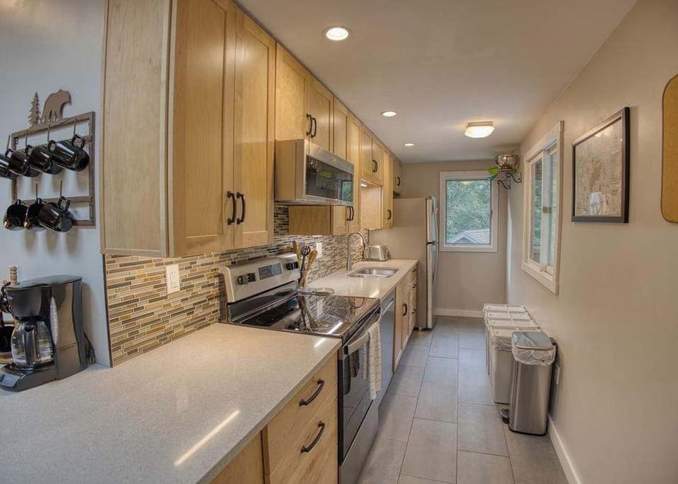 Fully stocked galley kitchen - cook up comfort with everything you need 