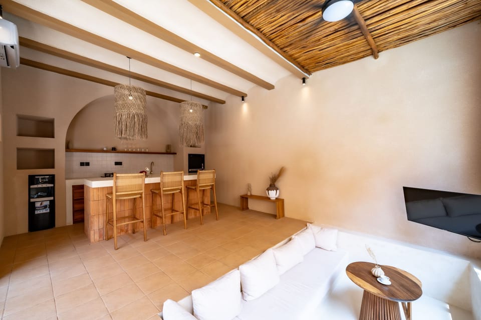 Luxury Villa, 1 Bedroom, Patio, Pool View | Living room | 40-inch TV with cable channels
