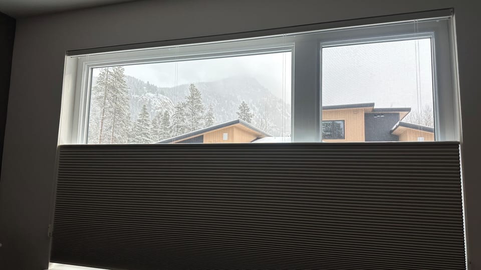 Blinds that open from the top & bottom, great for privacy and mountain views!