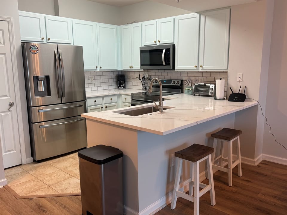 This well equipped kitchen also offers additional seating for two people.