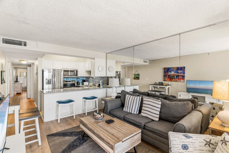 Open-Concept coastal living creates a bright and welcoming gathering space.