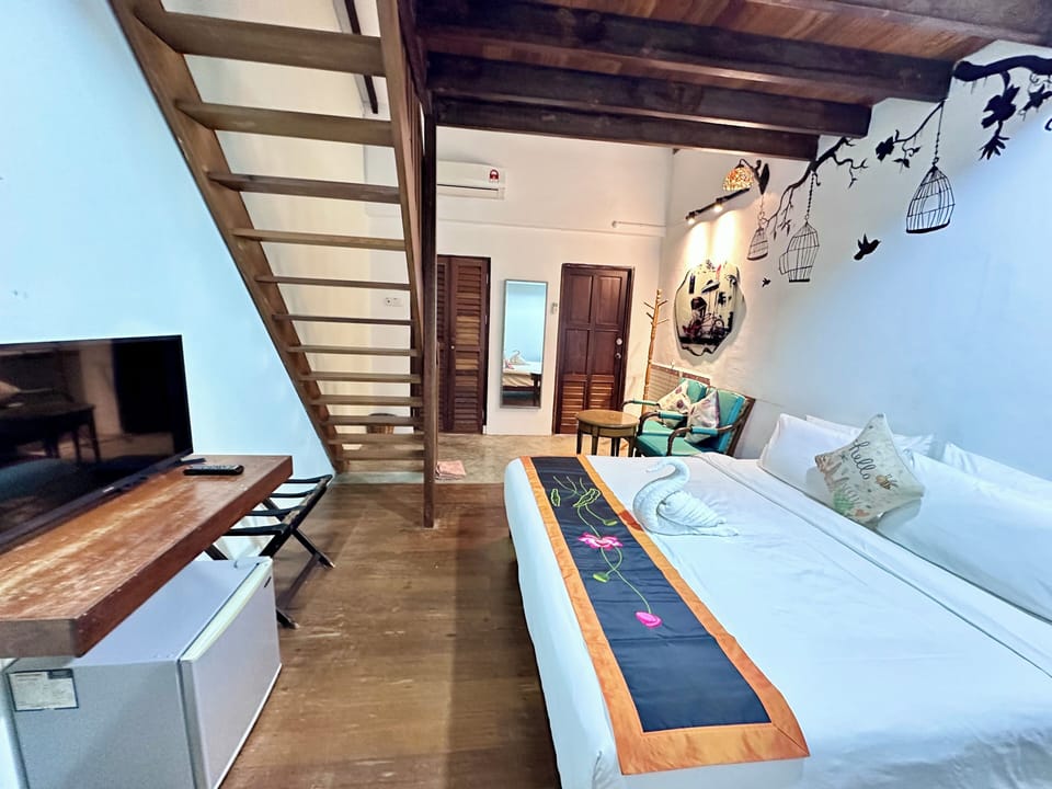 Family Room, Balcony, City View | Free WiFi