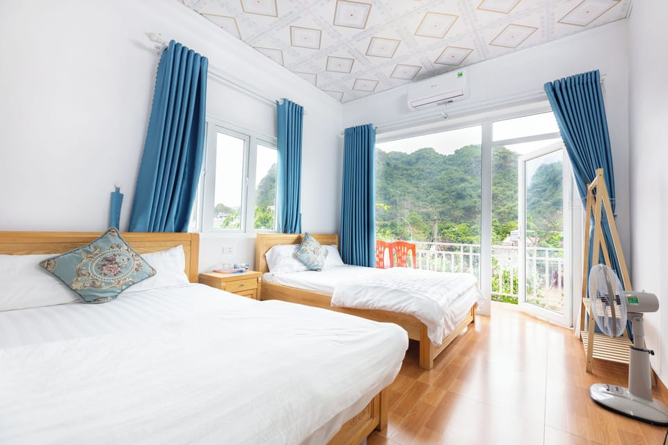 Deluxe Quadruple Room, 2 Double Beds | Desk, laptop workspace, soundproofing, free WiFi