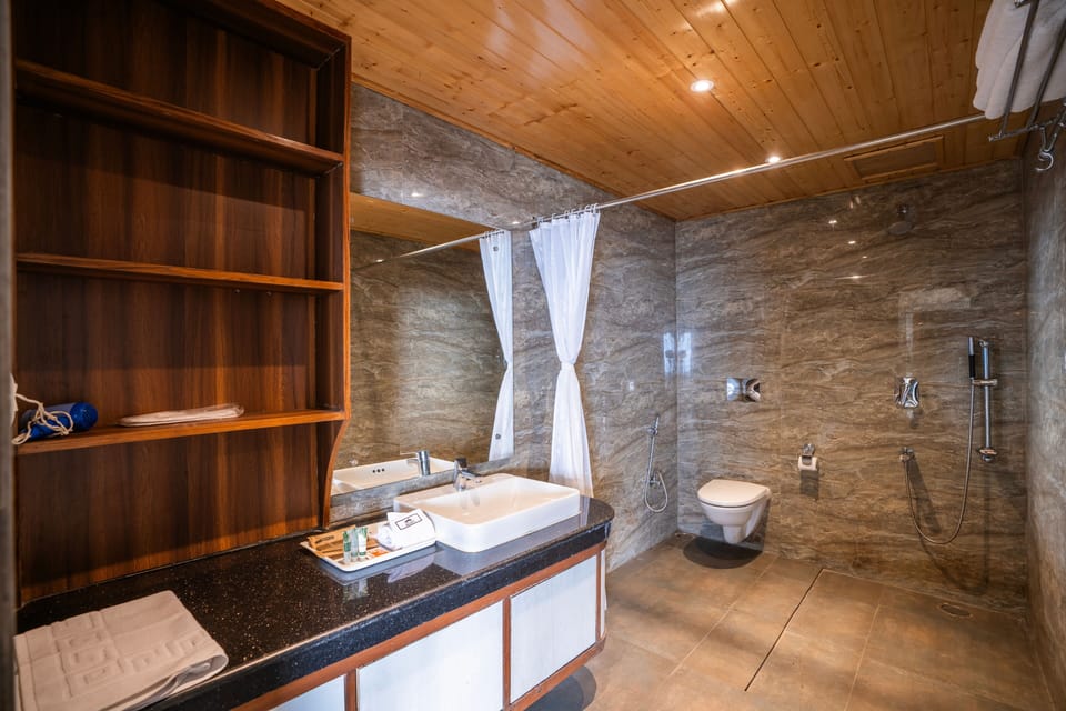Shower, free toiletries, slippers, towels