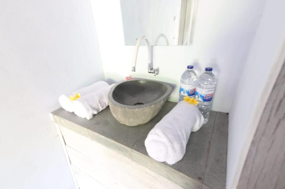 Shower, towels, soap, shampoo