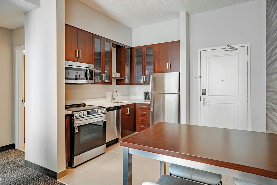 Suite, 1 Bedroom | In-room safe, desk, laptop workspace, iron/ironing board