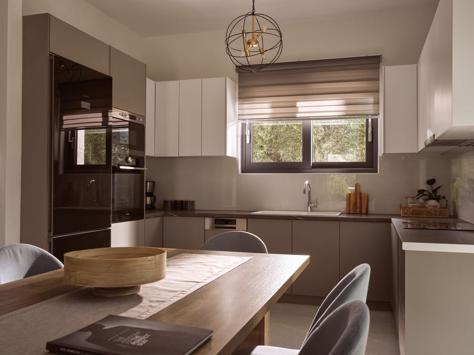 The fully equipped kitchen blends style for effortless cooking.