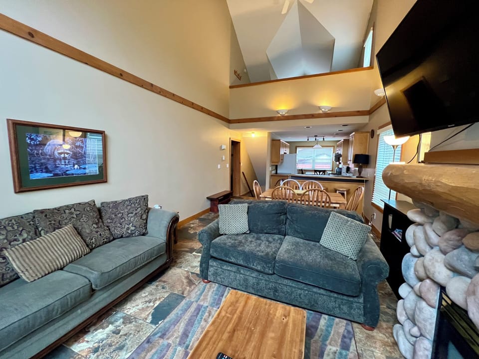 The Main Living Area, with Smart TV, comfy seating and a gas fireplace.